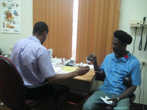 dr-gavin-henry-with-patient